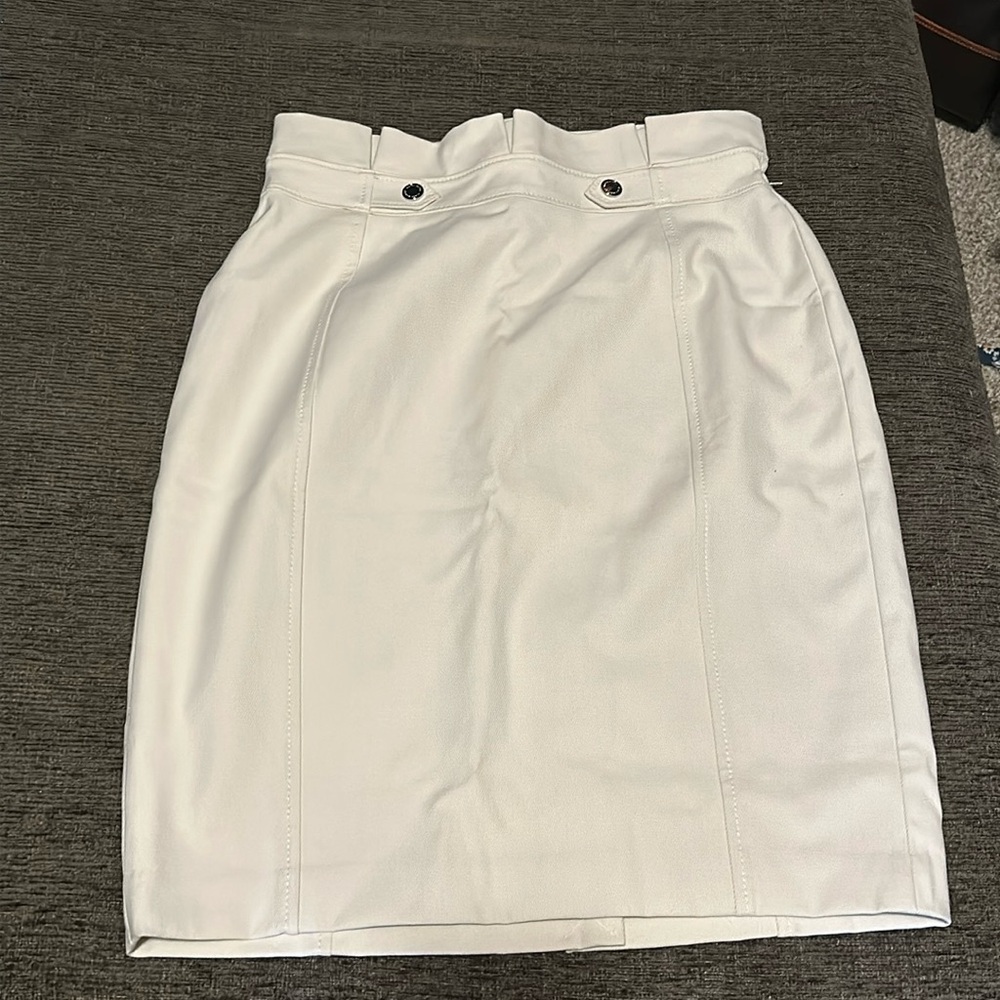 Brand new ivory colored pencil skirt with tag.
